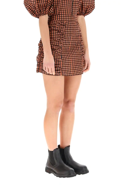Shop Ganni Seersucker Check Mini Skirt In Black,red,brown