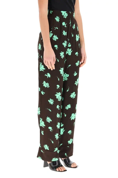 Shop Ganni Printed Pajamas Trousers In Brown,green