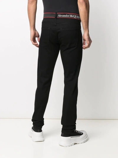 Shop Alexander Mcqueen Slim-fit Jeans In Black