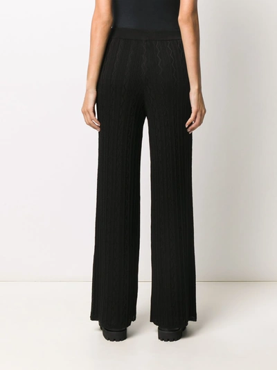 Shop M Missoni Trousers In Nero