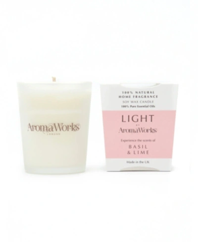 Shop Aromaworks Light Range Basil And Lime Candle, 2.65 oz In Pink