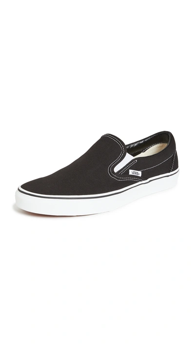 Shop Vans Classic Slip On Sneakers In Black
