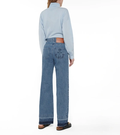 Shop Jw Anderson High-rise Flared Jeans In Blue