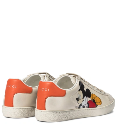 Shop Gucci X Disney® Ace Leather Sneakers In White
