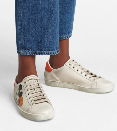 Shop Gucci X Disney® Ace Leather Sneakers In White