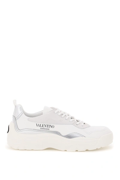 Shop Valentino Garavani Gumboy Sneakers In Bianco Ghiaccio Argento Bianco Nero Bian