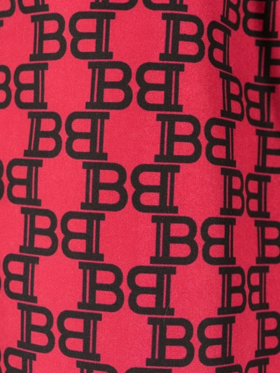 Shop Balmain Monogram Logo-print Swim Shorts In Red