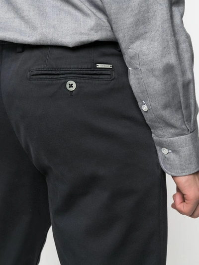 Shop Corneliani Slim-cut Cotton-blend Trousers In Black