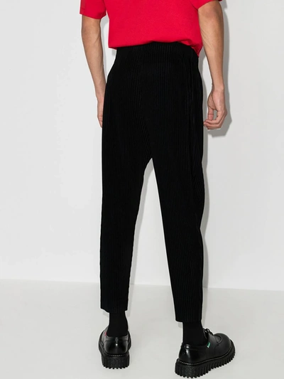 Shop Issey Miyake Plissierte Tapered-hose In Schwarz