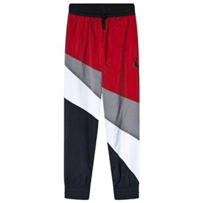 Shop Air Jordan Red Jumpman Trackpants