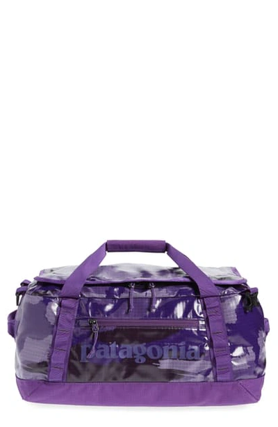 Shop Patagonia Black Hole Water Repellent 40-liter Duffle Bag In Home Planet Piton Purple-hppp