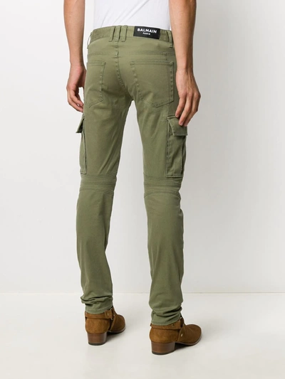 Shop Balmain Tapered Fit Cargo Trousers In Green