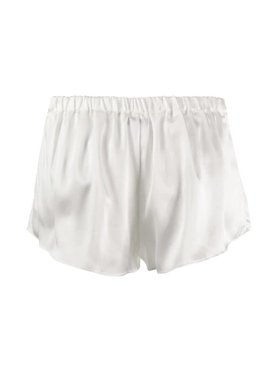 Shop Gilda & Pearl Sophia Silk Shorts In White