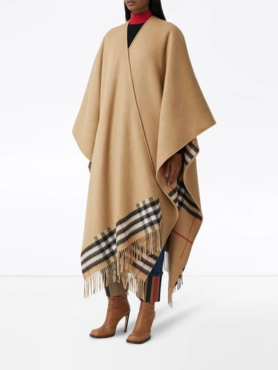 Shop Burberry Fringed Check Cape In Neutrals