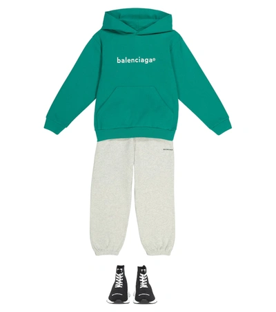 Shop Balenciaga Logo Cotton Jersey Hoodie In Green