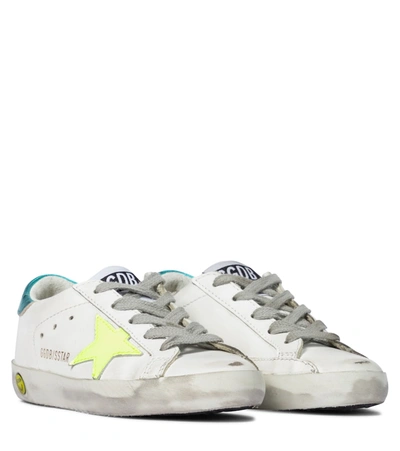 Shop Golden Goose Super-star Leather Sneakers In White/yellow Fluo