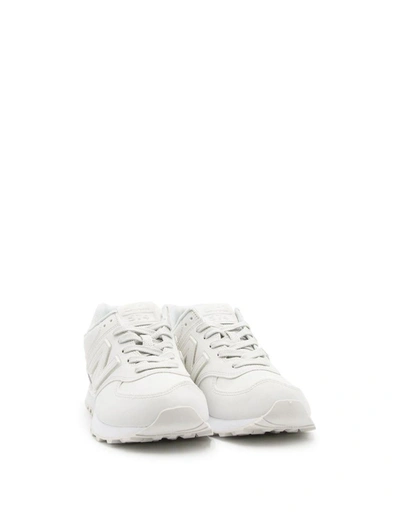 Shop New Balance Women's White Leather Sneakers