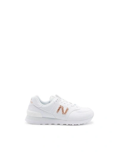 Shop New Balance Women's White Leather Sneakers