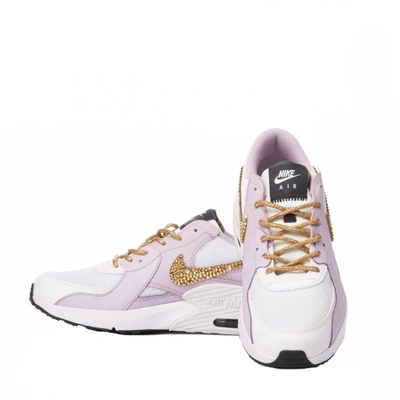 Shop Nike Women's Pink Leather Sneakers