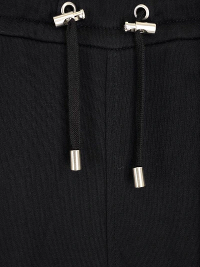 Shop Balmain Embossed Logo Sweatpants In Black