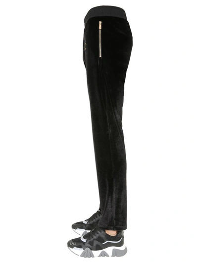 Shop Versace Medusa Crest Velvet Trousers In Black