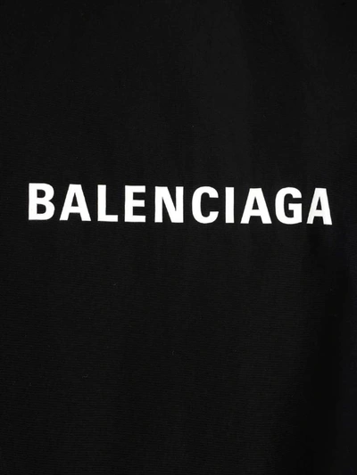 Shop Balenciaga Slogan Print Rain Coat In Black