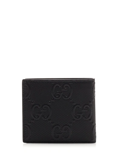 Shop Gucci Gg Embossed Bifold Wallet In Black