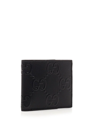 Shop Gucci Gg Embossed Bifold Wallet In Black
