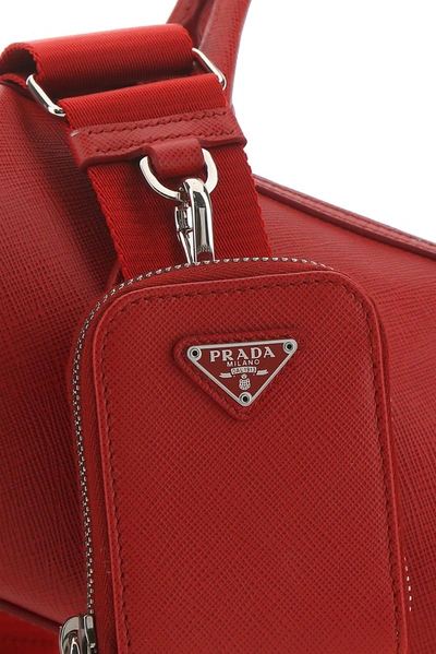 Shop Prada Logo Plaque Saffiano Top Handle Bag In Red