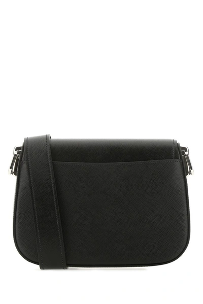 Shop Prada Logo Saffiano Shoulder Bag In Black