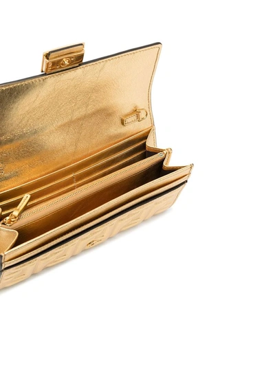 Shop Fendi Baguette Continental Chain Wallet In Gold