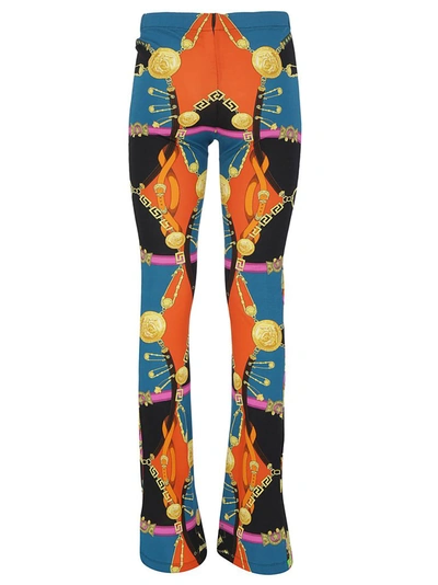 Shop Versace Graphic Printed Flared Pants In Multi