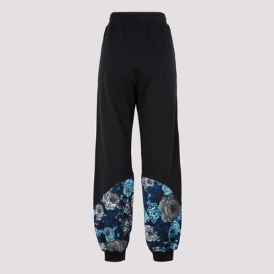 Shop Msgm Floral Print Sweatpants In Black