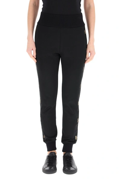 Shop Fendi Logo Side Striped Track Pants In Black