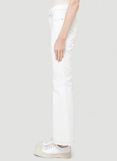 Shop Jw Anderson Boot Cut Jeans In White