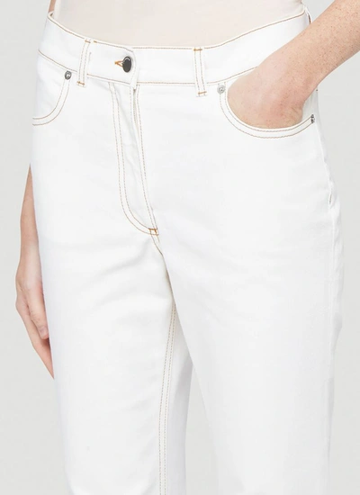 Shop Jw Anderson Boot Cut Jeans In White