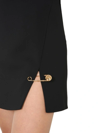 Shop Versace Safety Pin Accent Mini Skirt In Black