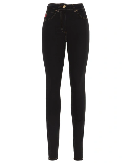 Shop Versace Rose Embroidered Skinny Leg Jeans In Black