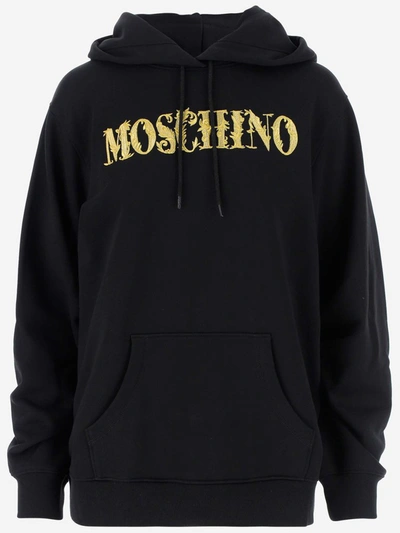 Shop Moschino Logo Embroidered Hoodie In Black