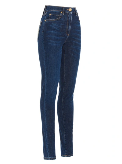 Shop Versace Medusa Print Jeans In Blue