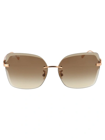 Shop Jimmy Choo Eyewear Corin Rimless Sunglasses In Gold