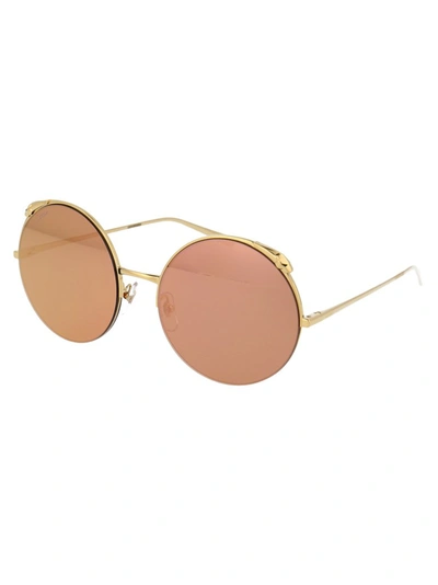 Shop Cartier Round Framed Sunglasses In Gold