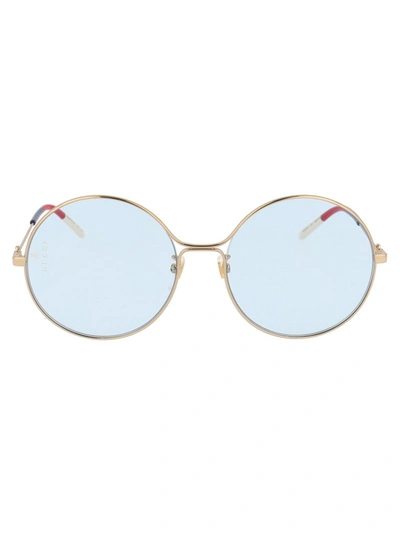 Shop Gucci Eyewear Round Frame Sunglasses In Gold