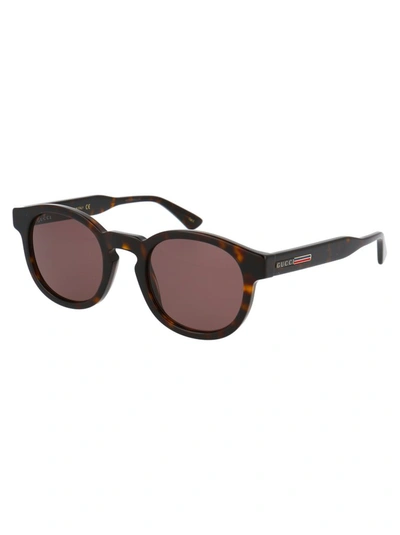 Shop Gucci Eyewear Round Frame Sunglasses In Brown