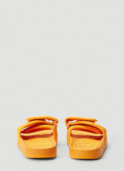 Shop Adidas Originals By Pharrell Williams Adidas By Pharrell Williams Boost Slides In Orange