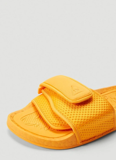 Shop Adidas Originals By Pharrell Williams Adidas By Pharrell Williams Boost Slides In Orange