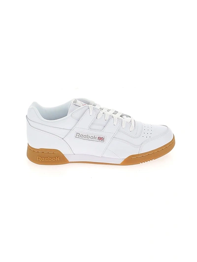 Shop Reebok Workout Plus Sneakers In White