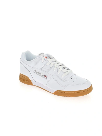 Shop Reebok Workout Plus Sneakers In White