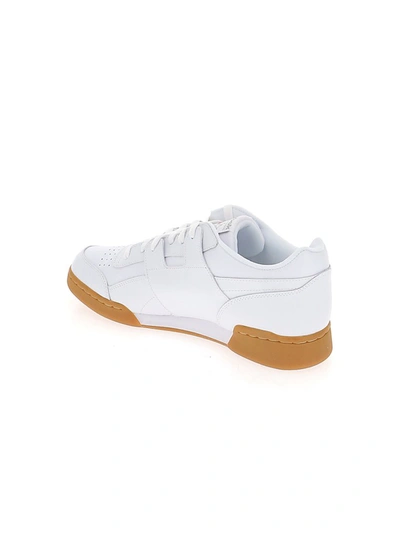 Shop Reebok Workout Plus Sneakers In White