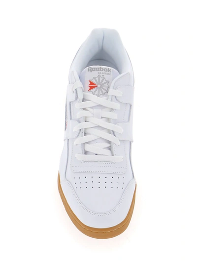 Shop Reebok Workout Plus Sneakers In White